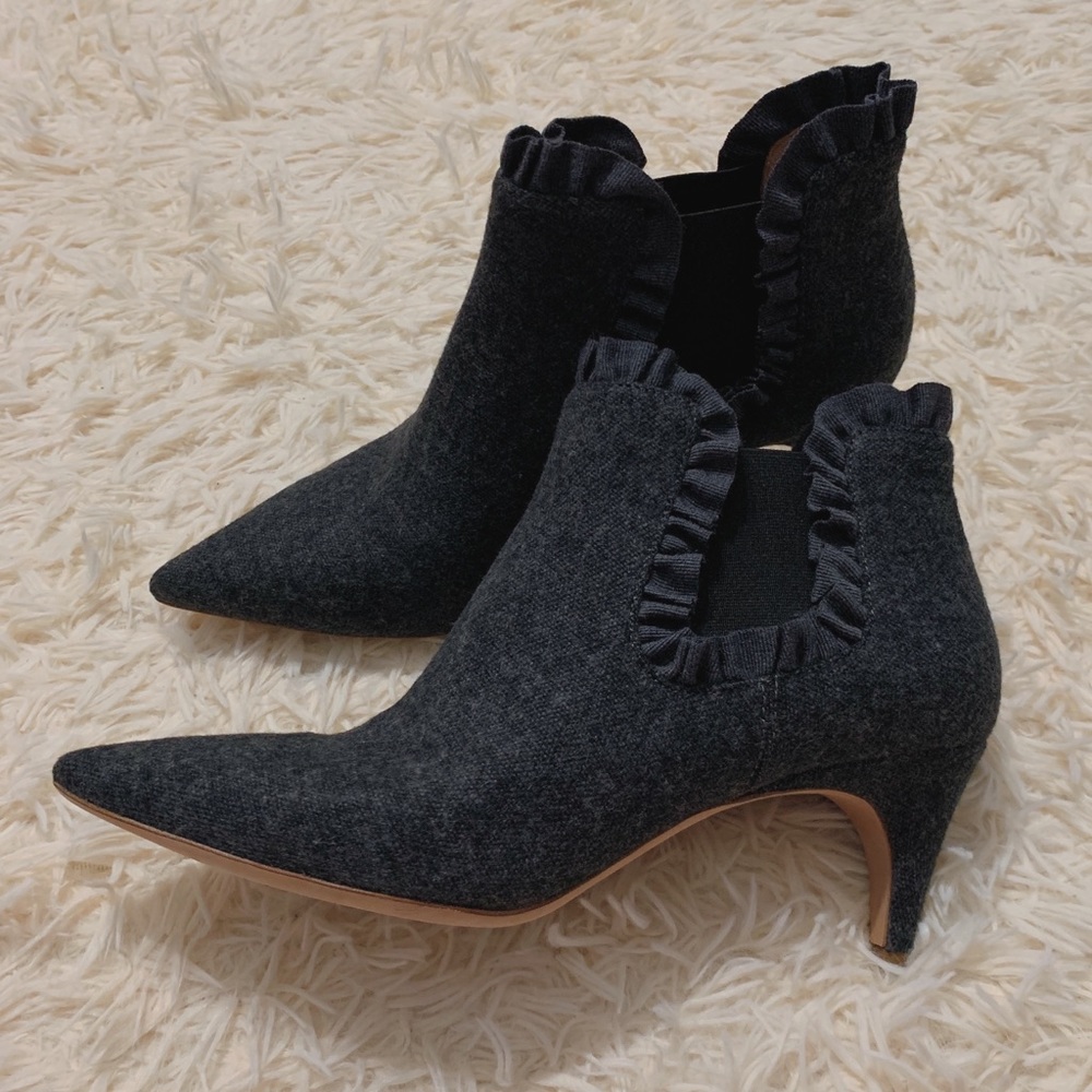 Elegant Black Heeled Boots with Ruffle Trim